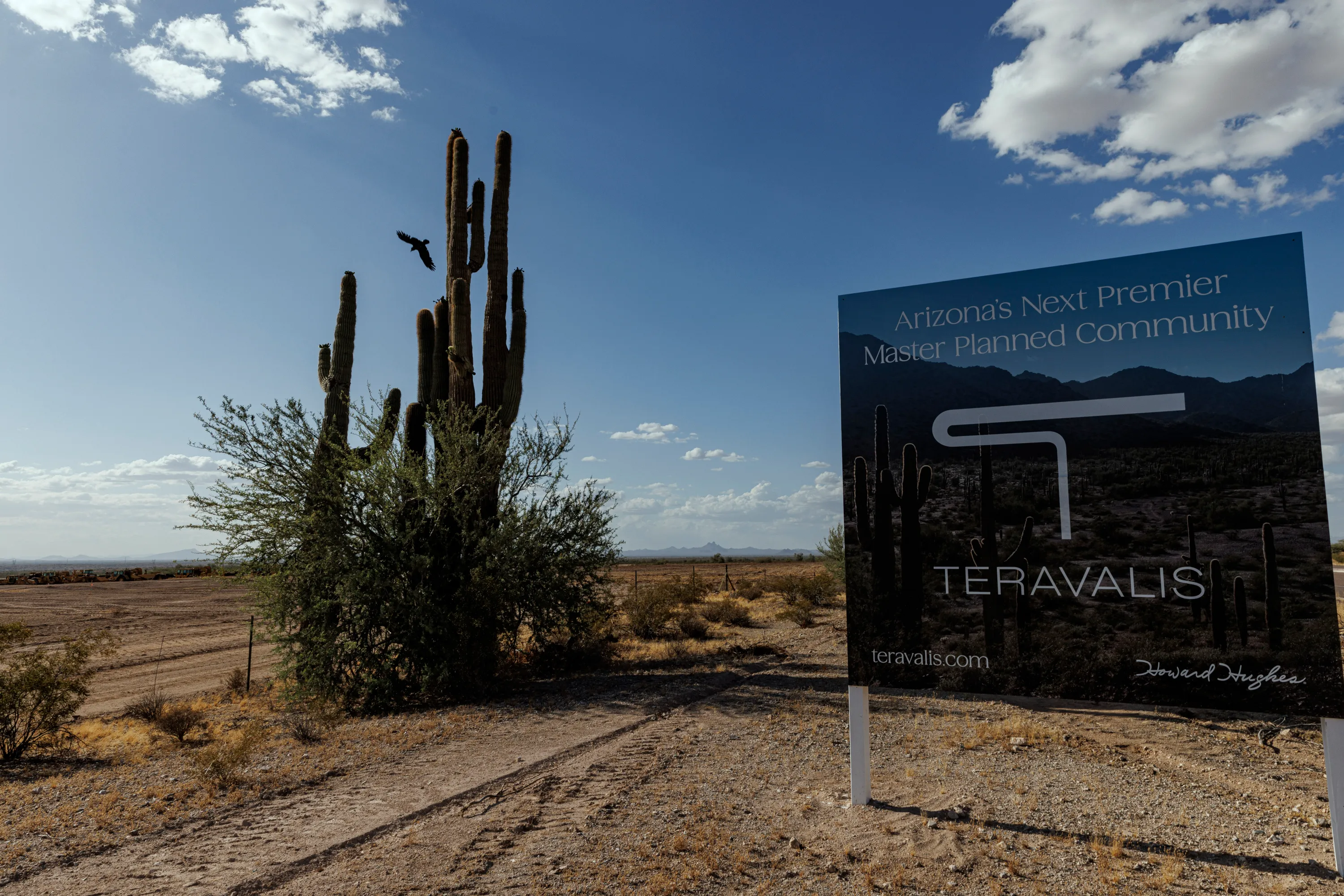 A sign in the desert that says
