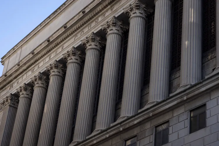 Large pillars on the exterior of the Milwaukee County Courthouse in downtown Milwaukee, Wisconsin.